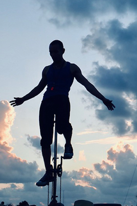 unicyclist at dusk